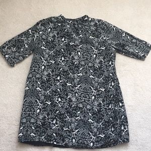 Black dress with white tree and animal accents